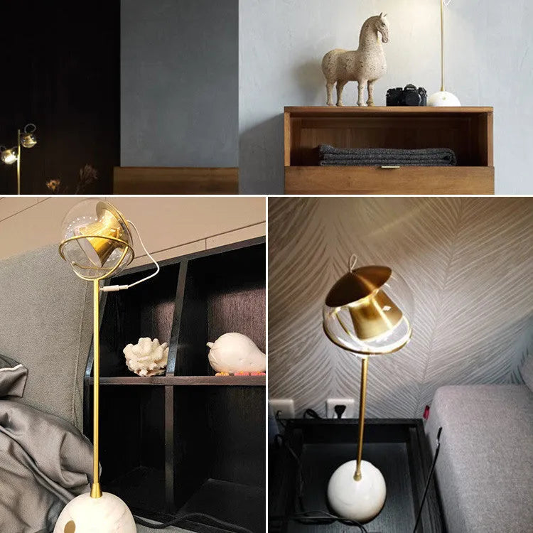 Modern glass lampshade desk lamp with touch dimmer control.