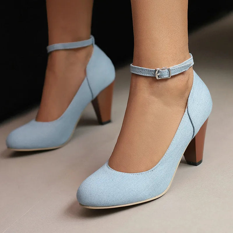 Women's blue denim platform heel boots with buckle fastening and waterproof construction