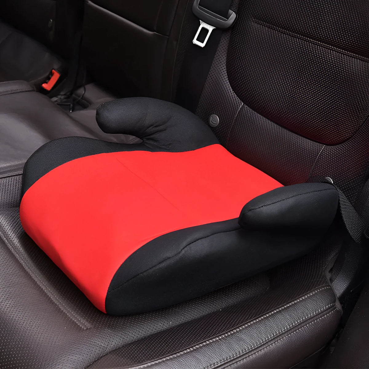 Portable children's car seat in knitted cotton and plastic for ages 3 to 12, shown in one of nine colour options
