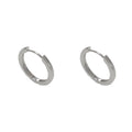 Geometric round women's ear clip with eyelet detail in gold or silver finish
