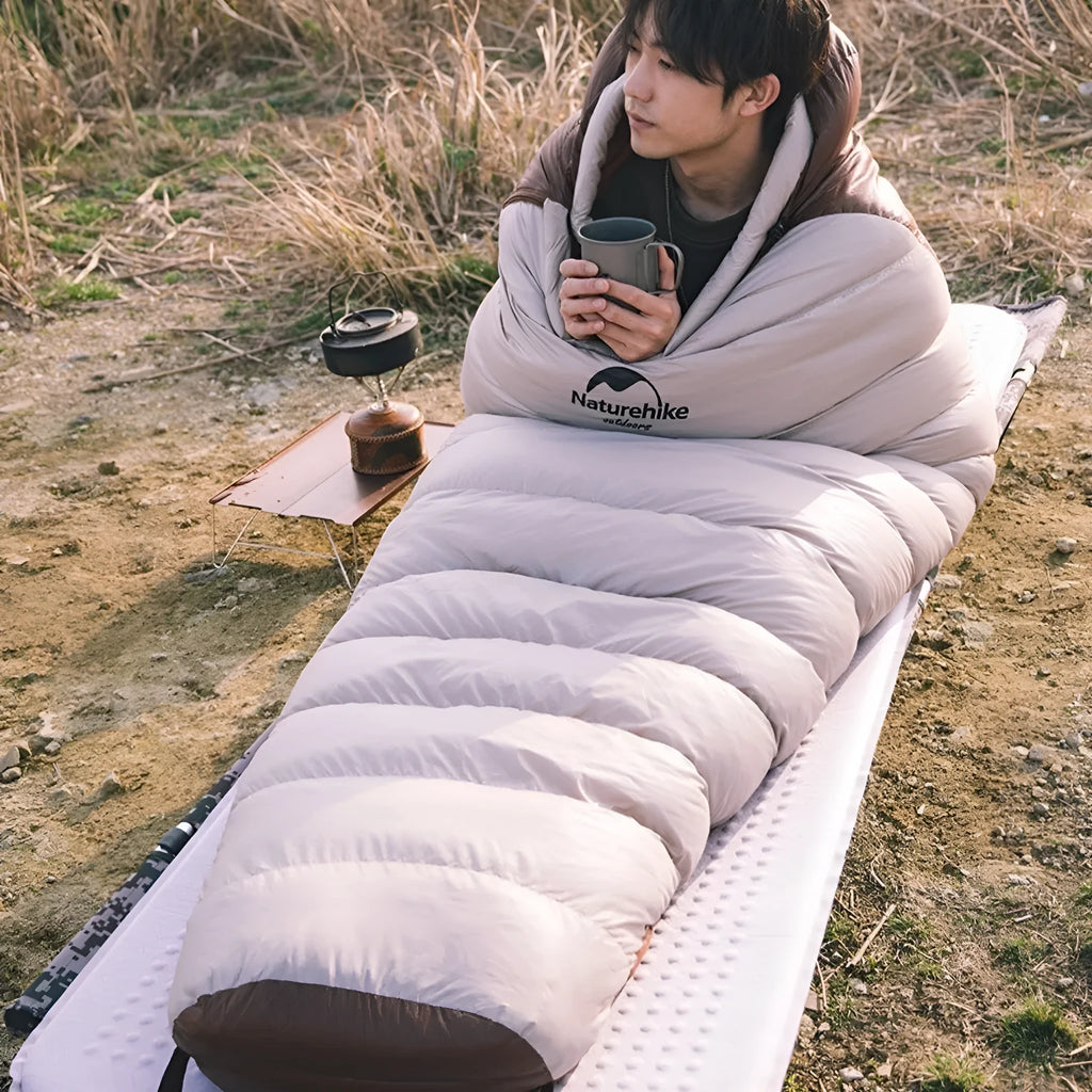 Mummy style goose down sleeping bag with storage bag for camping