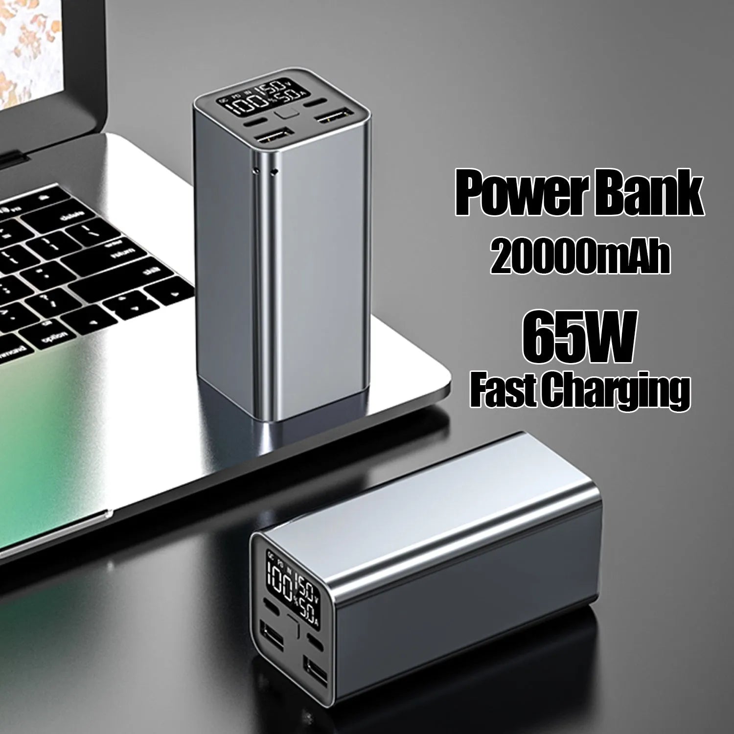 Black metal 65W laptop power bank with 20000mAh capacity showing size next to a laptop.