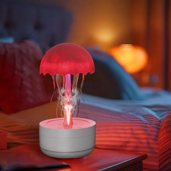 White jellyfish design humidifier diffuser with colourful night lights on desk