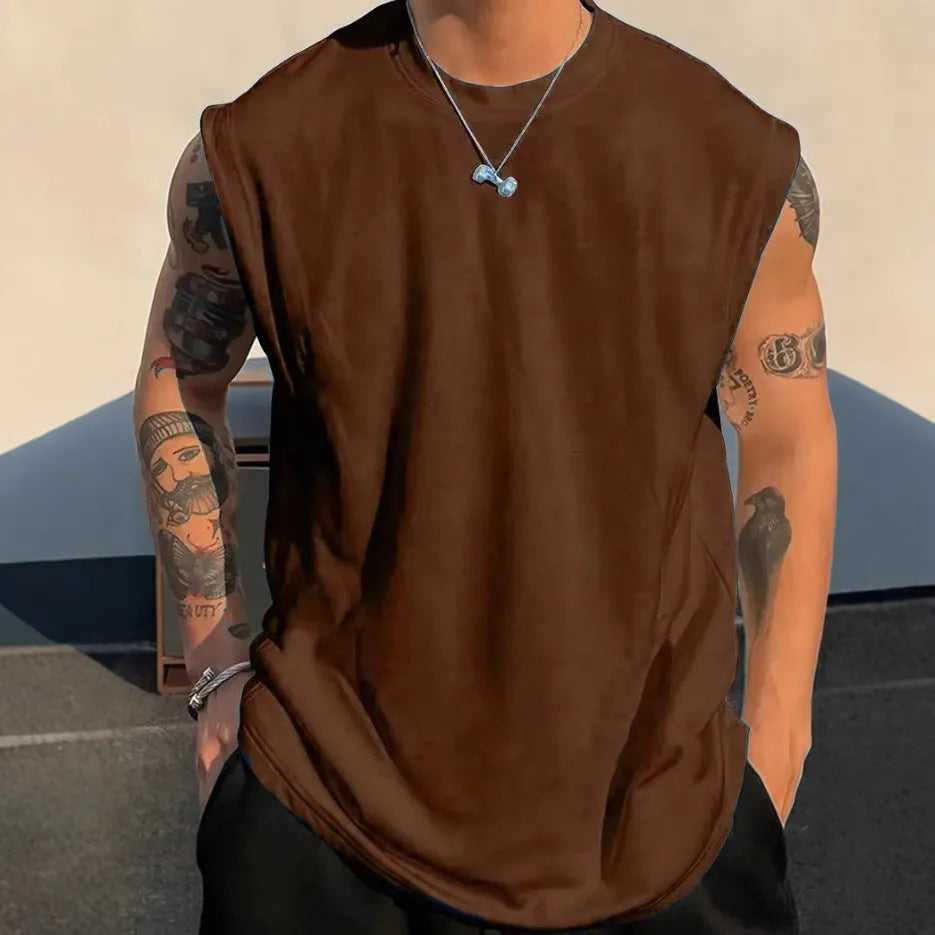 Men's loose solid colour cotton tank top on a hanger, showing straight hem and sleeveless design.