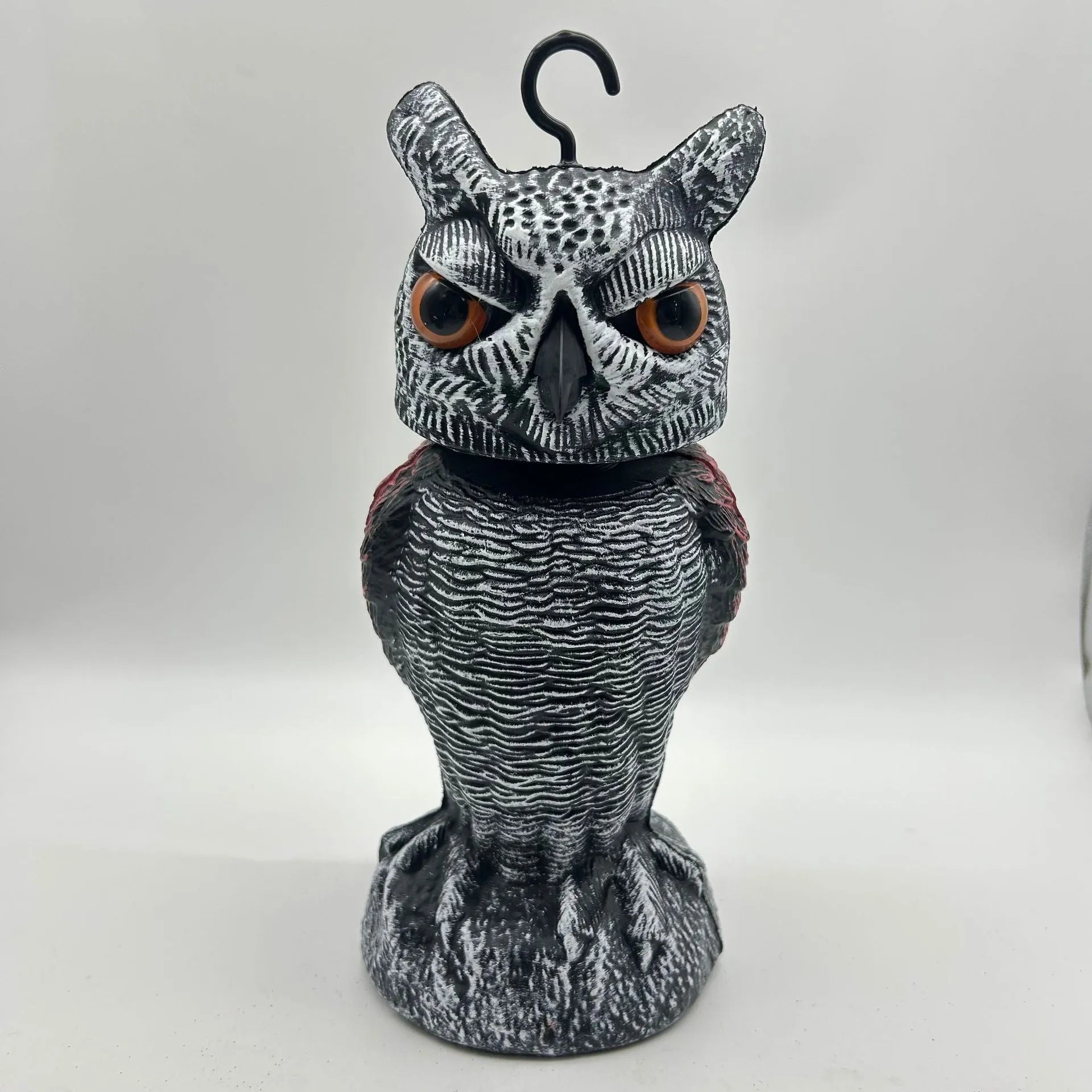 PE plastic artificial owl decoy with moving head, a bird scare ornament for outdoor use.