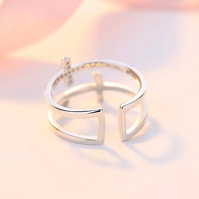 Women's miniature geometric copper ring with adjustable open design and inlaid zircon stones.