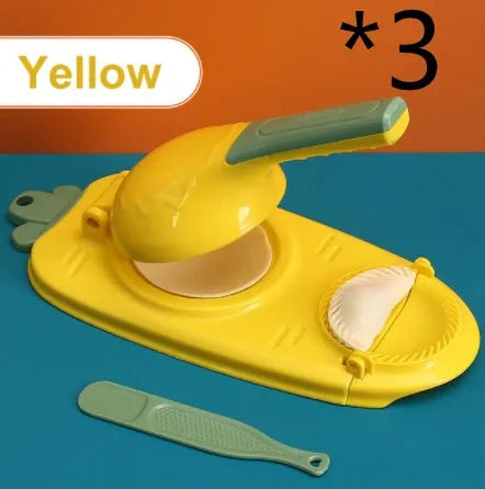 Orange and white manual dumpling skin press tool with ergonomic handle and hanging hole