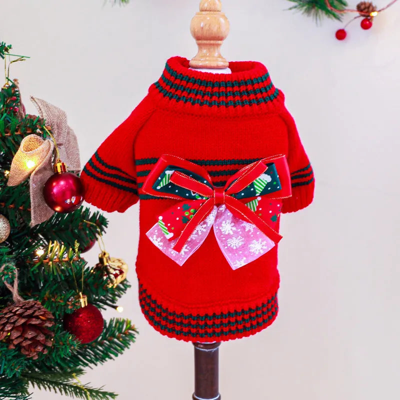 Red polyester Christmas jumper for a small dog on a white background.