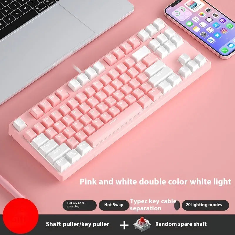 87-key wired mechanical keyboard with two-tone keycaps, shown with switch puller and cleaning brush