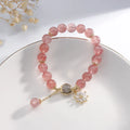 Korean style strawberry quartz crystal bracelet with electroplated floral decorations in Mori aesthetic design
