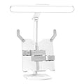 Adjustable black desk lamp with gooseneck arm and clamp, showing three light colour temperature settings.