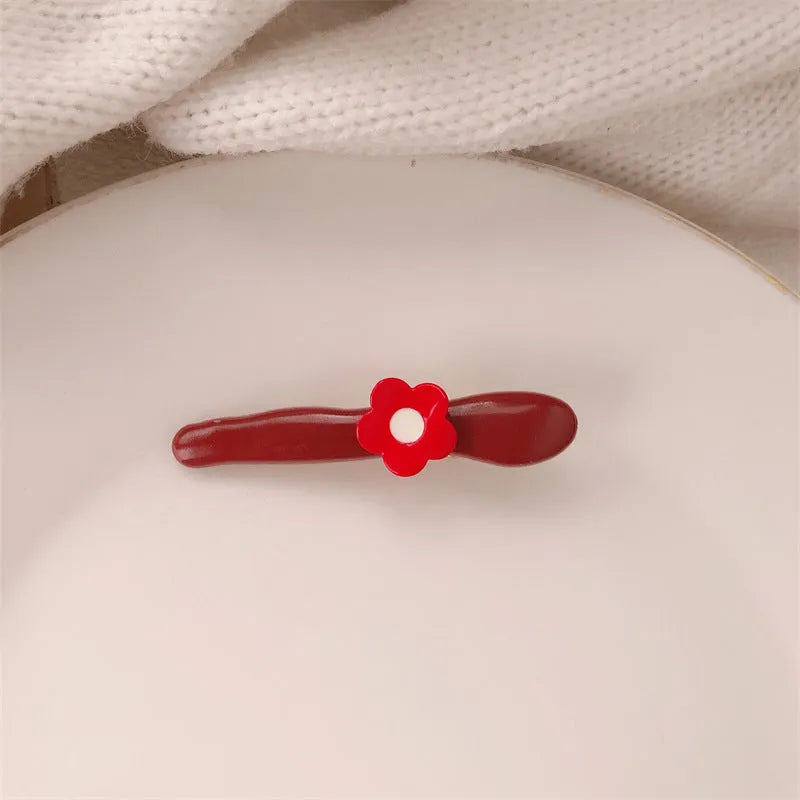 Red stereo love heart-shaped hairpin with French retro dots and willow leaf design
