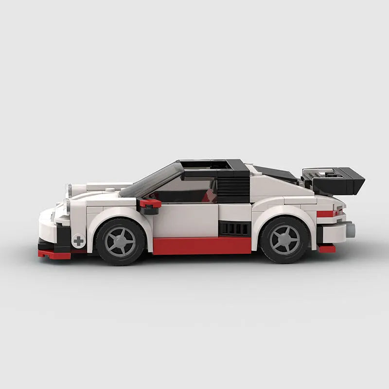 Small particle plastic building block set assembled into a sports car moc puzzle cool convertible car model showing the M10231 colour option