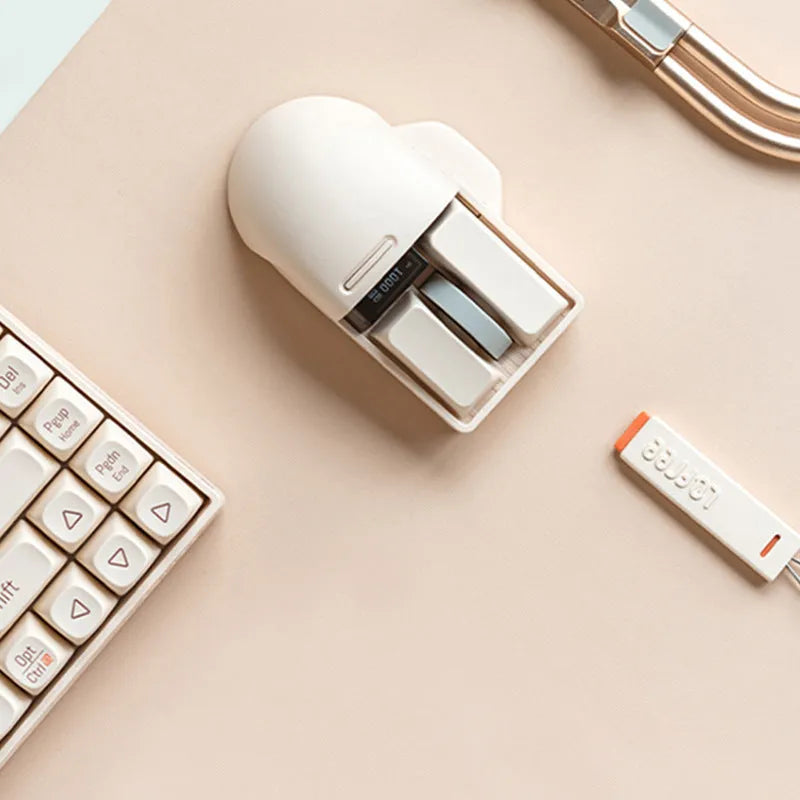 Xiaoqiao tofu colour wireless mouse with ergonomic design on a desk