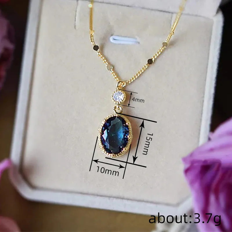 Gold geometric pendant necklace with French retro style on a model.