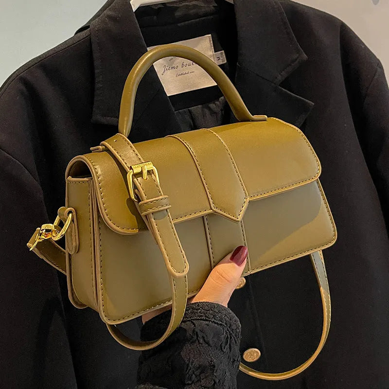 Women's PU leather messenger bag in neutral colour with file organiser interior and sandwich pocket