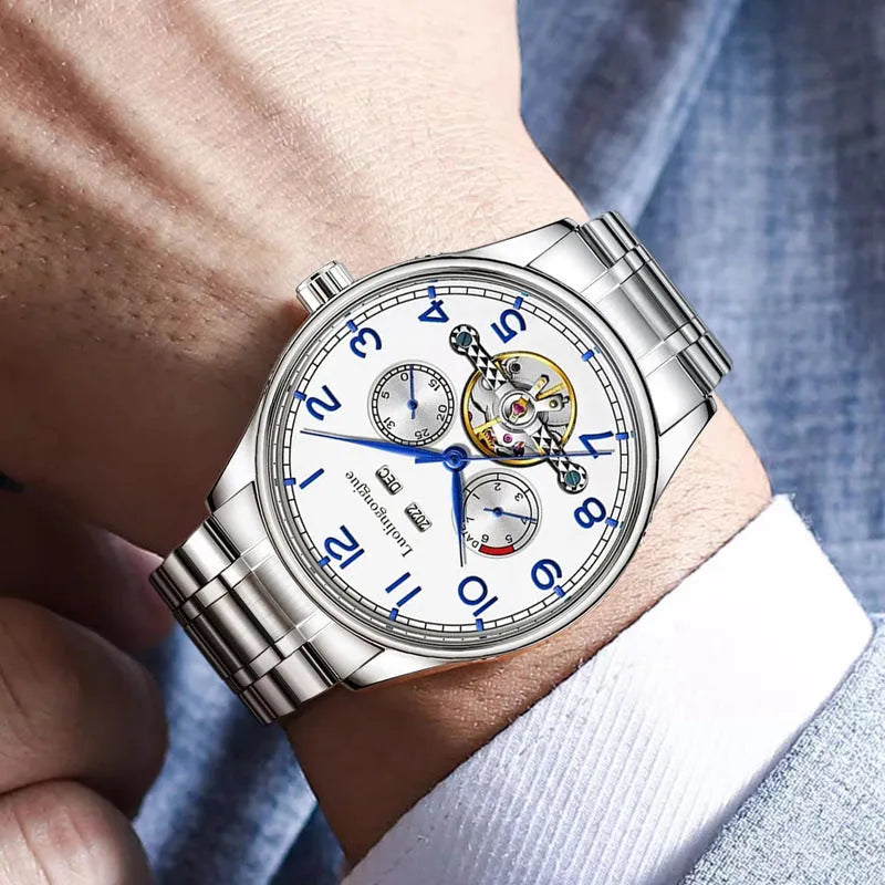 Men's stainless steel mechanical watch with sapphire glass on a leather strap.