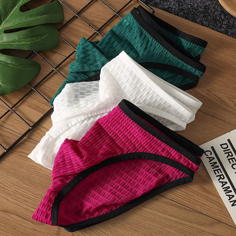 Men's low waist transparent visual lace underwear in multiple colours on a size chart