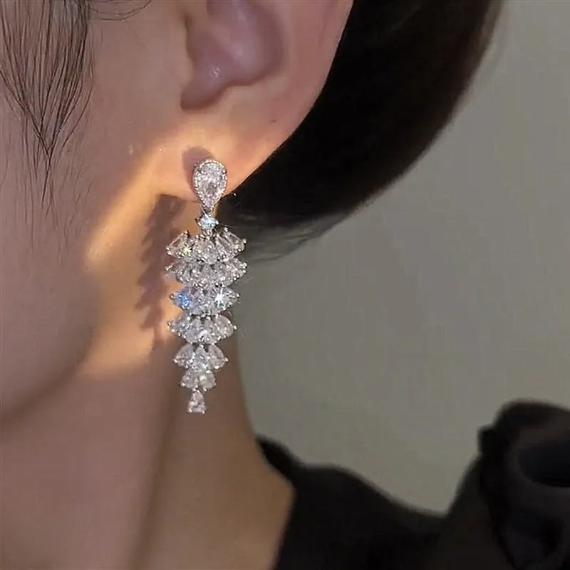 Christmas tree drop earrings with zircon stones in silver pagoda colour