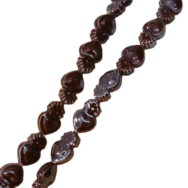Love heart torch-shaped ceramic beads, about 10 x 15mm with 1.7mm straight hole, in cream white and other colours.