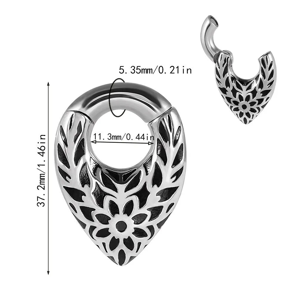A stainless steel drop-shaped ear extender with totem detailing, shown on a plain background.
