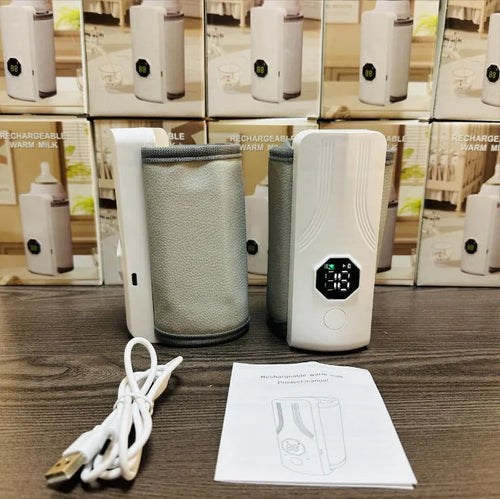 Grey and white car charger electric milk warmer for baby bottles on a 12V DC socket.