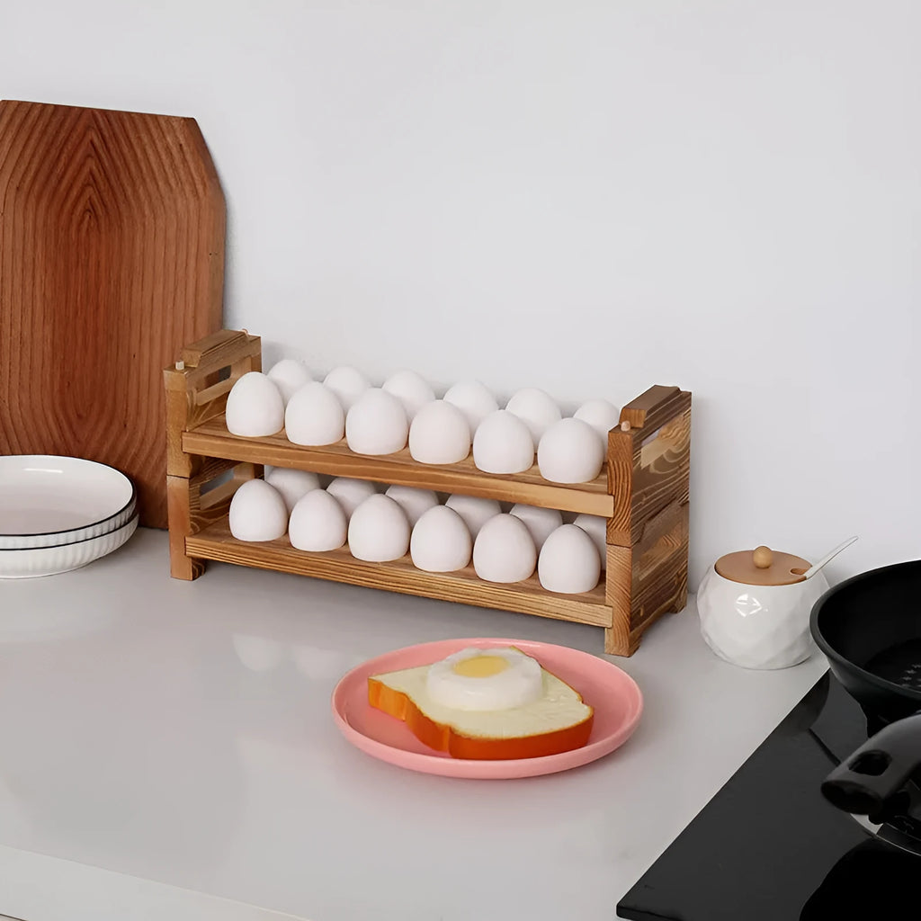 Solid wood egg storage rack in red Fire colour on a kitchen countertop
