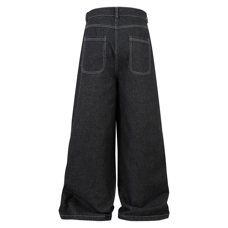 Black pleated workwear jeans with multiple pockets showing mid-waist fit and zip placket opening
