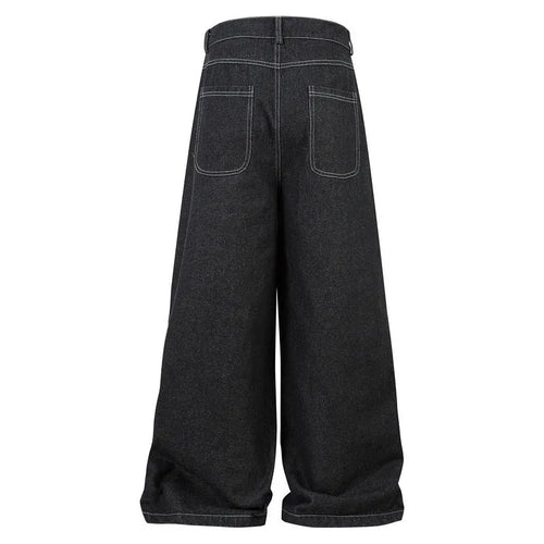 Black pleated workwear jeans with multiple pockets showing mid-waist fit and zip placket opening