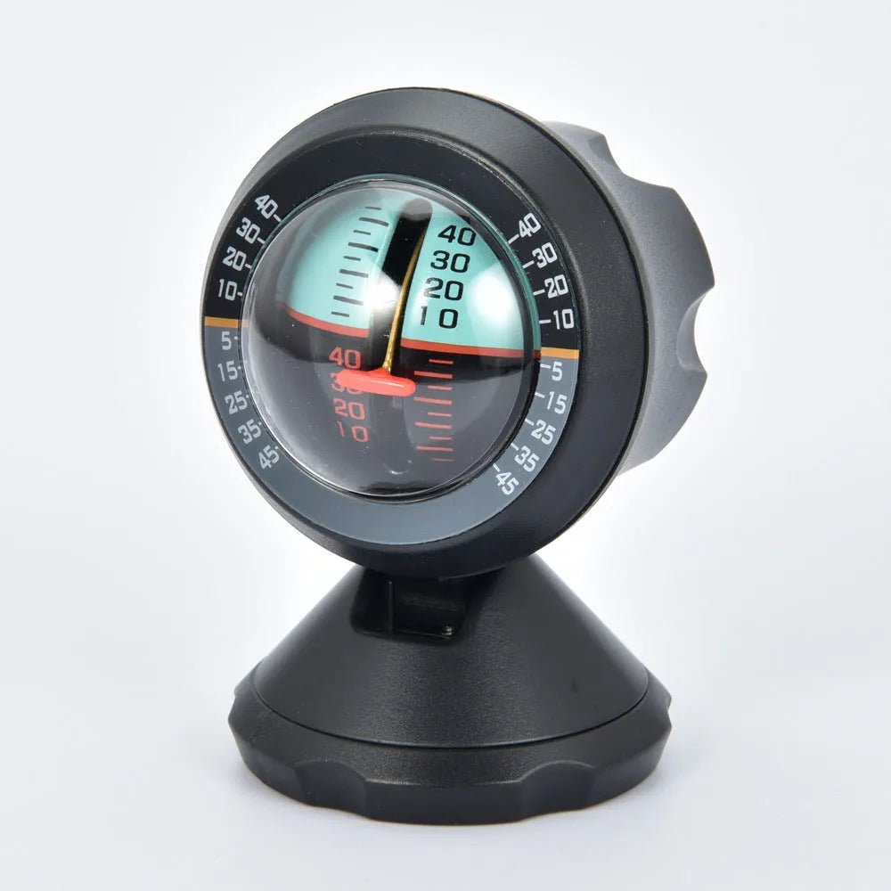 Black vehicle mounted slope meter for measuring inclination and rotation angles on dashboard.