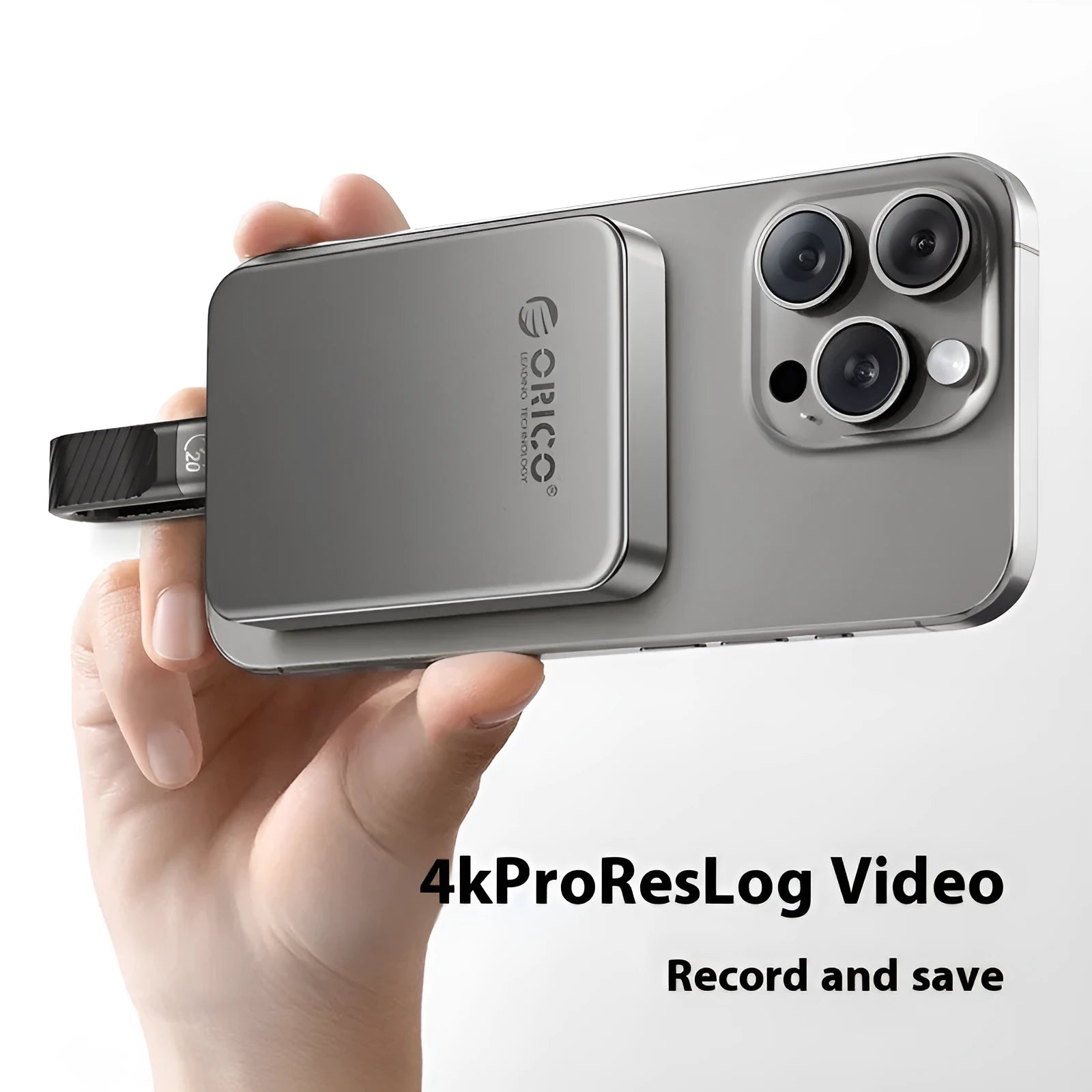 Grey magnetic mobile external SSD for phones and computers with a C to C cable and magnetic ring.