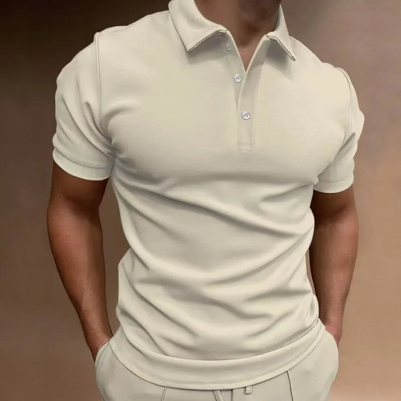 Man modelling a loose fit grey cotton blend short sleeve t-shirt.