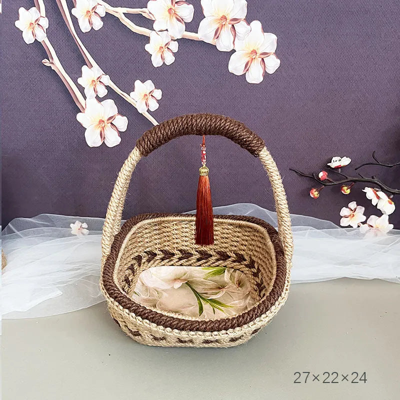Hand-woven natural straw basket in a rustic style, measuring 19cm by 12cm.