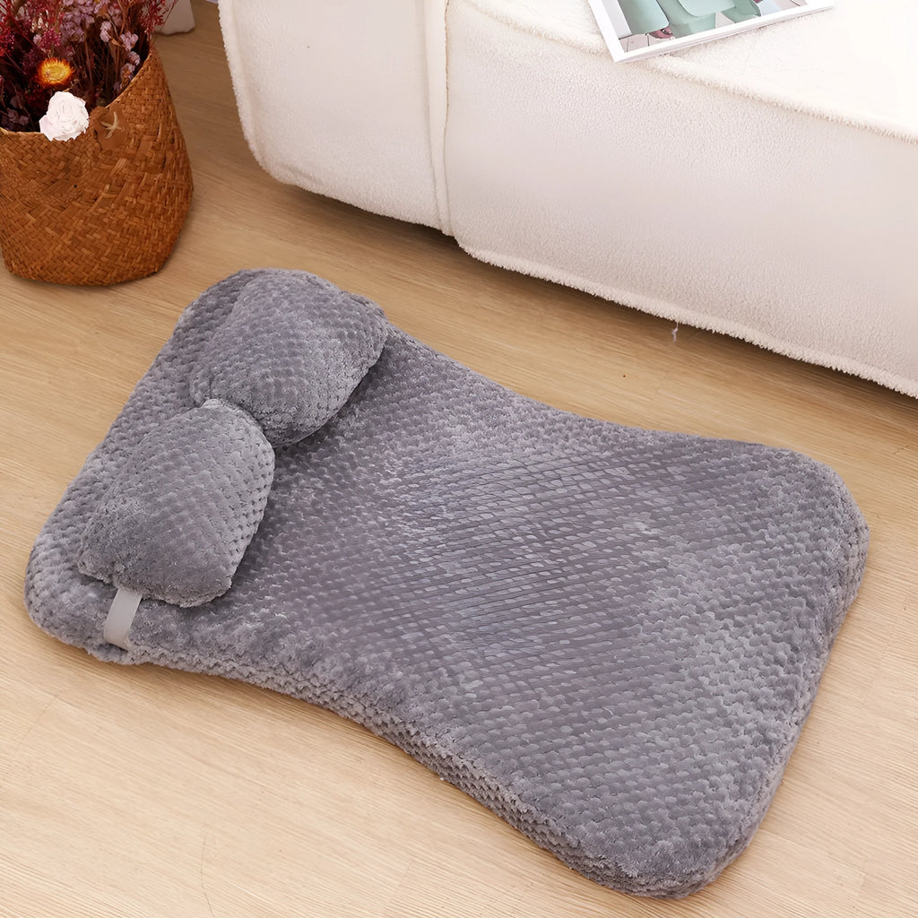 Soft plush pet bed mat with attached pillow in grey, available in sizes S to XL