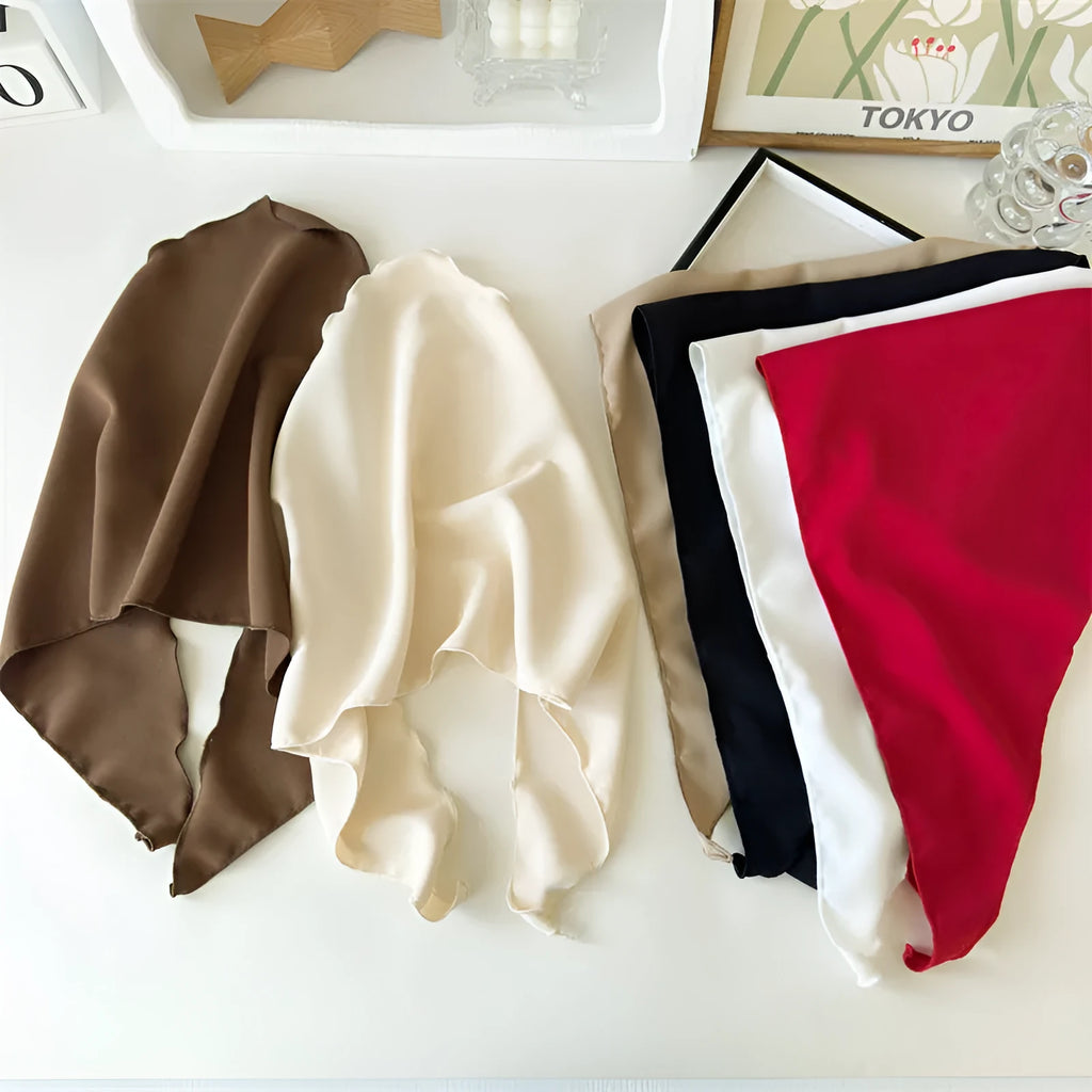 Women's solid colour triangle cloth headscarf in a neutral tone, displayed flat for easy viewing