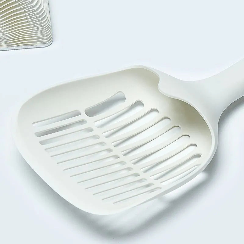 White plastic cat litter scoop with base, 29.5 x 12.8 cm, for cleaning cat litter trays