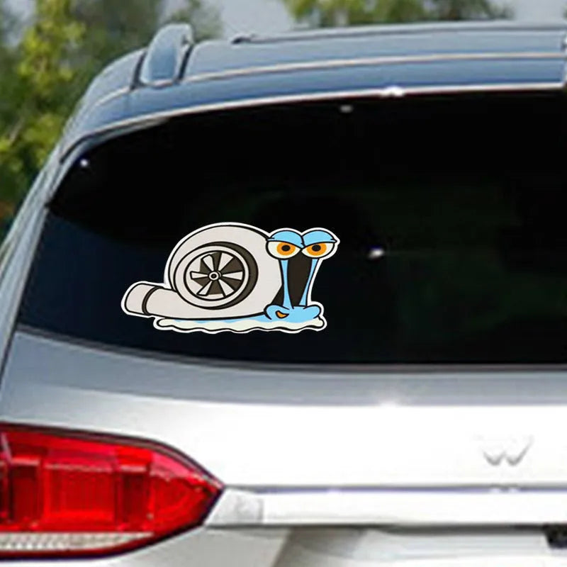 White reflective cartoon snail car sticker measuring 12 by 8 centimetres.