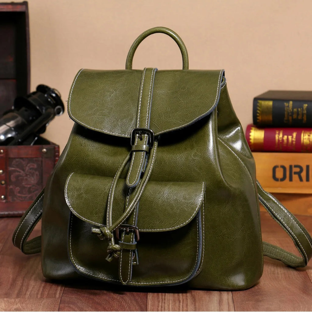 Korean style black cowhide leather backpack with front pocket and pull-belt