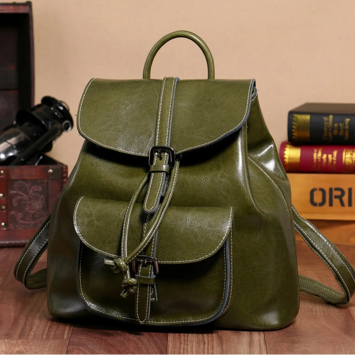Korean style black cowhide leather backpack with front pocket and pull-belt