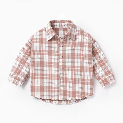 A boys' long sleeve cotton shirt with a lattice and cartoon pattern, shown in a light blue colour.