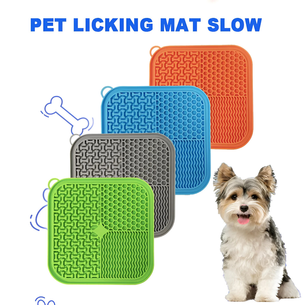Blue silicone dog licking mat with textured surface and suction cups on a clean floor.