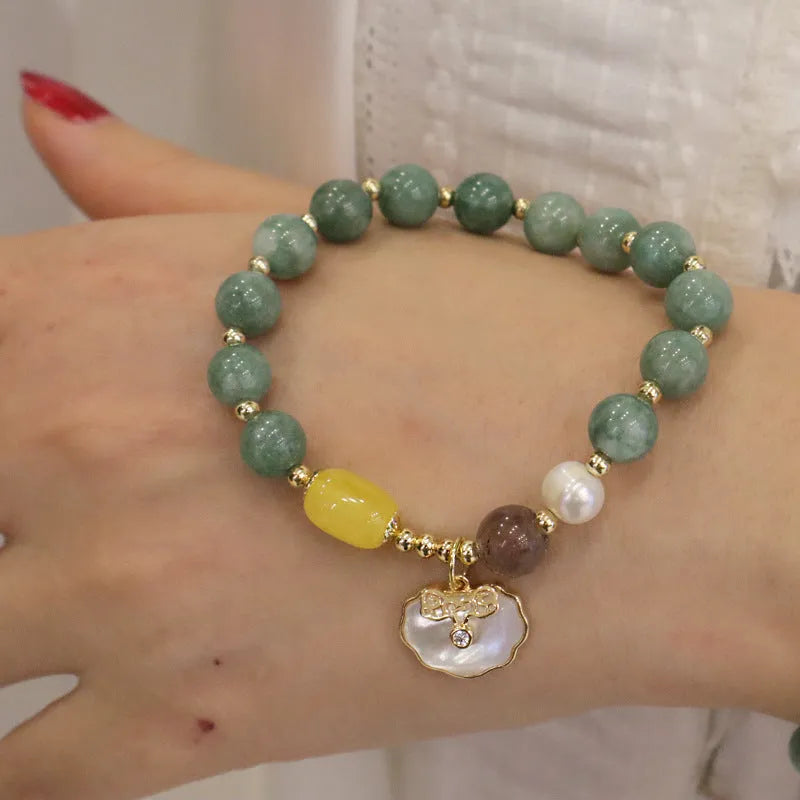 Women's green jade shell bracelet with adjustable fit in casual style