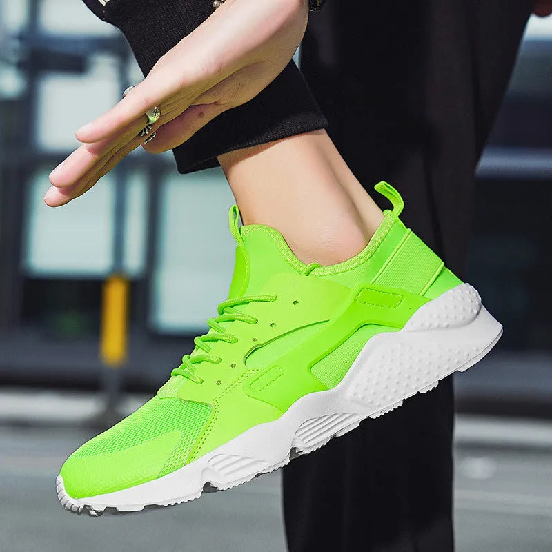 Men's mesh casual shoes with cross shoulder straps in green colour with front lace-up design