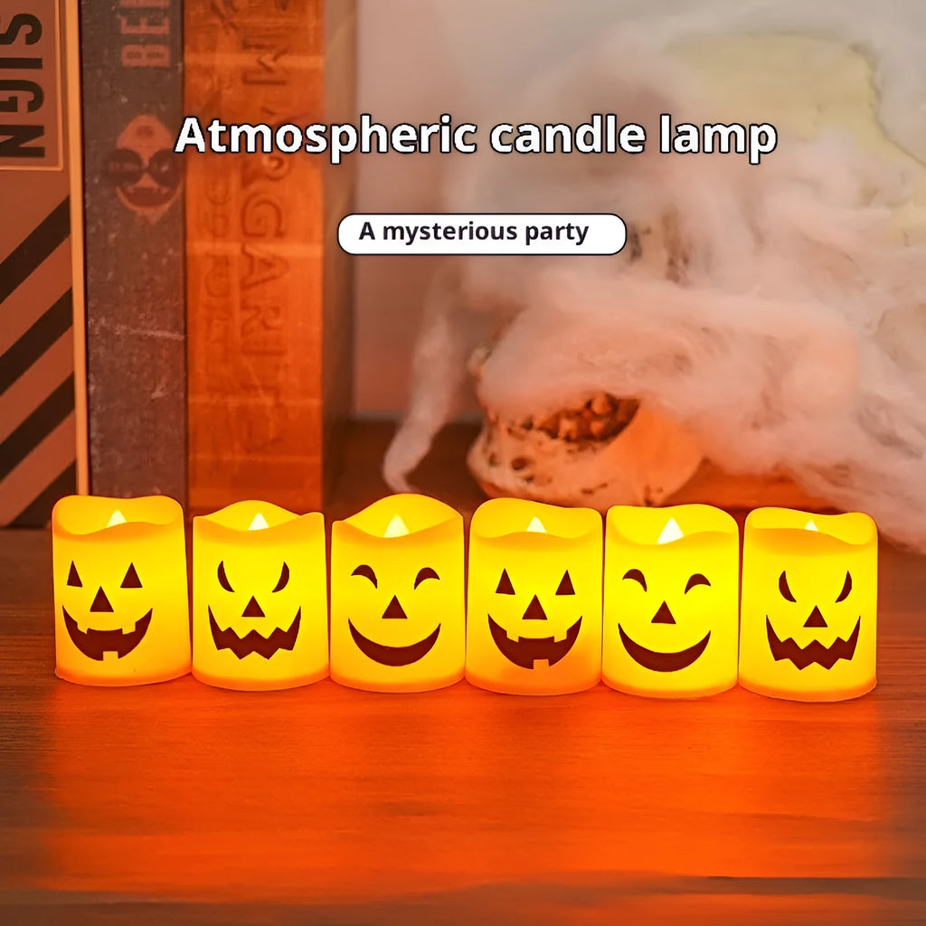 Set of six plastic pumpkin-coloured Halloween electric candle lamps in European style on a dark background