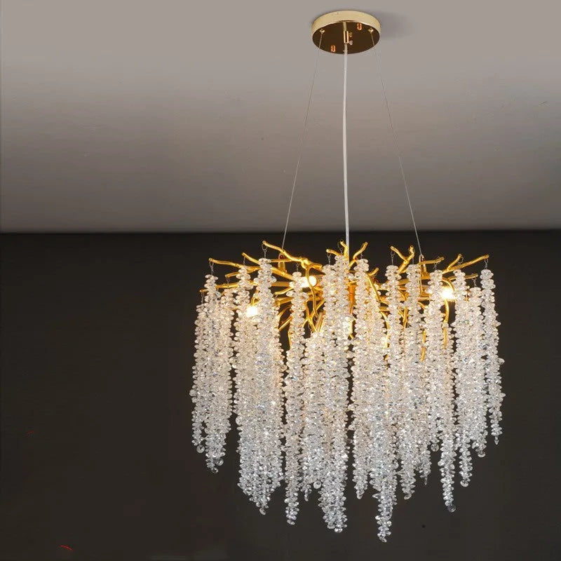 Modern crystal and aluminium alloy LED chandelier light fixture with adjustable height.