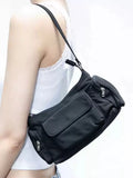 Black nylon lightweight shoulder bag with double pockets showing side line design detail