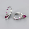 Women's heart-shaped drop earrings with a coloured gemstone, in gold or white gold plating.