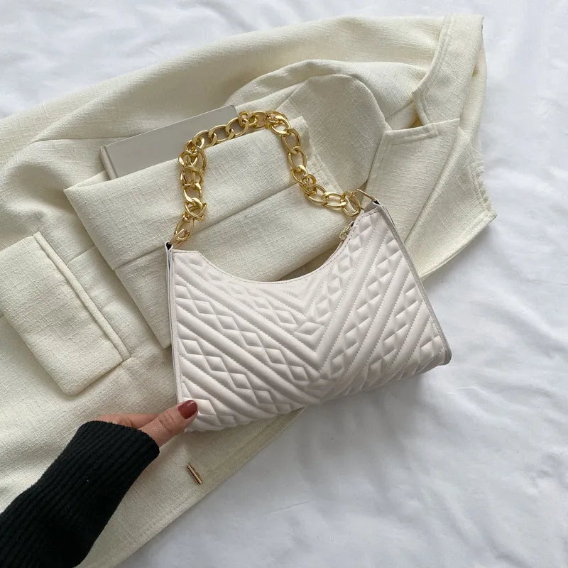 Brown pleated PU chain baguette shoulder bag showing square shape and soft handles.
