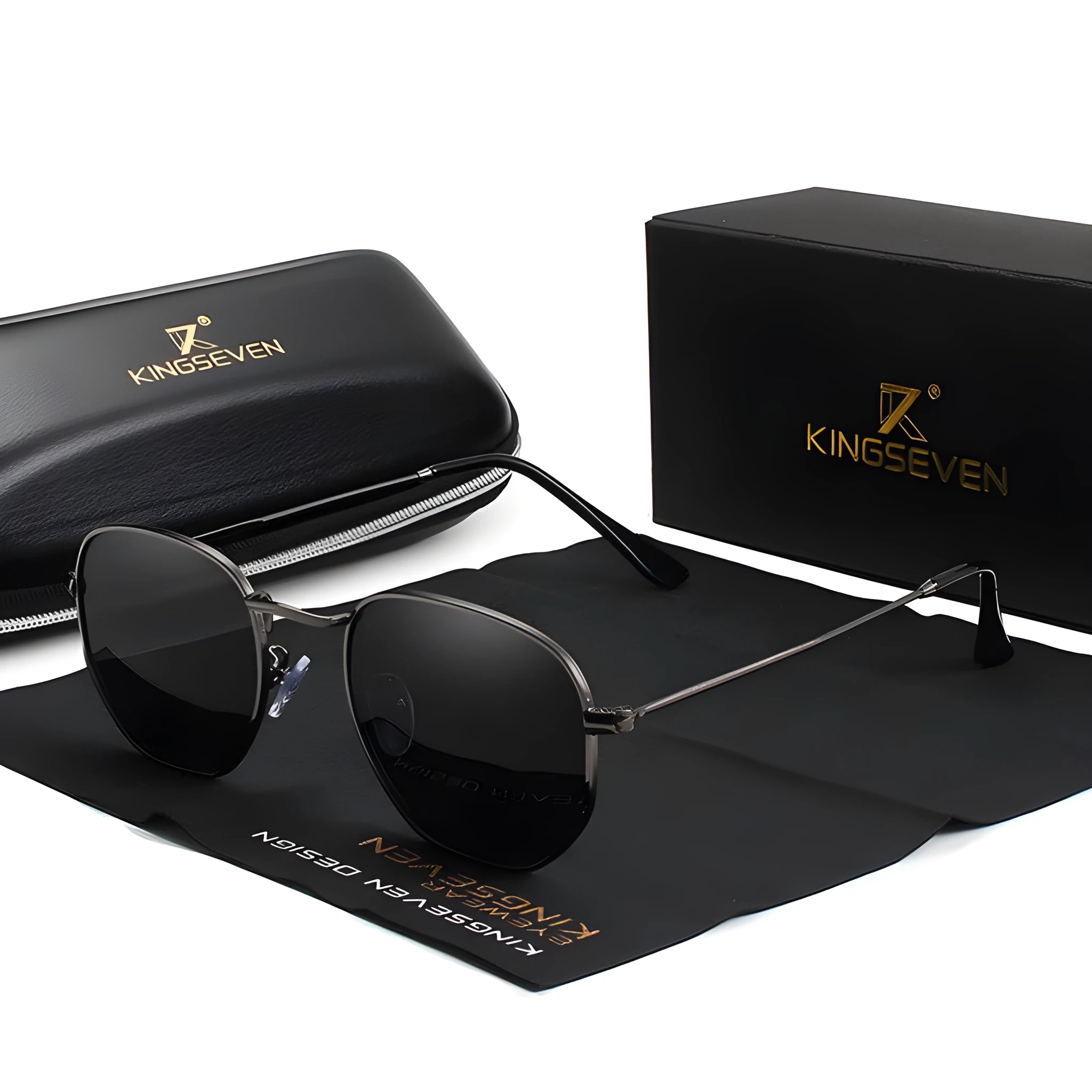 Classic round retro sunglasses for men in gun grey finish with UV400 lenses on a wooden table.