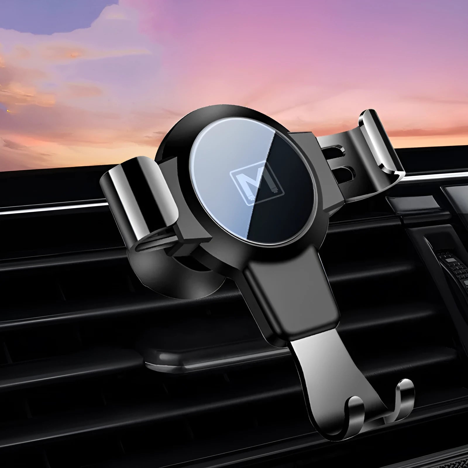 Black ABS gravity phone holder mounted on a car air vent with a mobile phone secured.